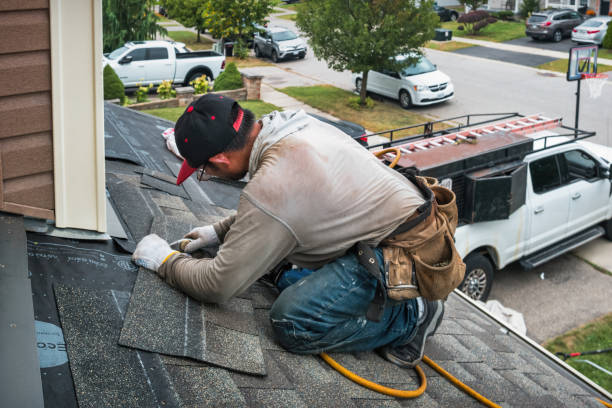 Professional Gutter Repair And Installation technician working in Surfside, FL